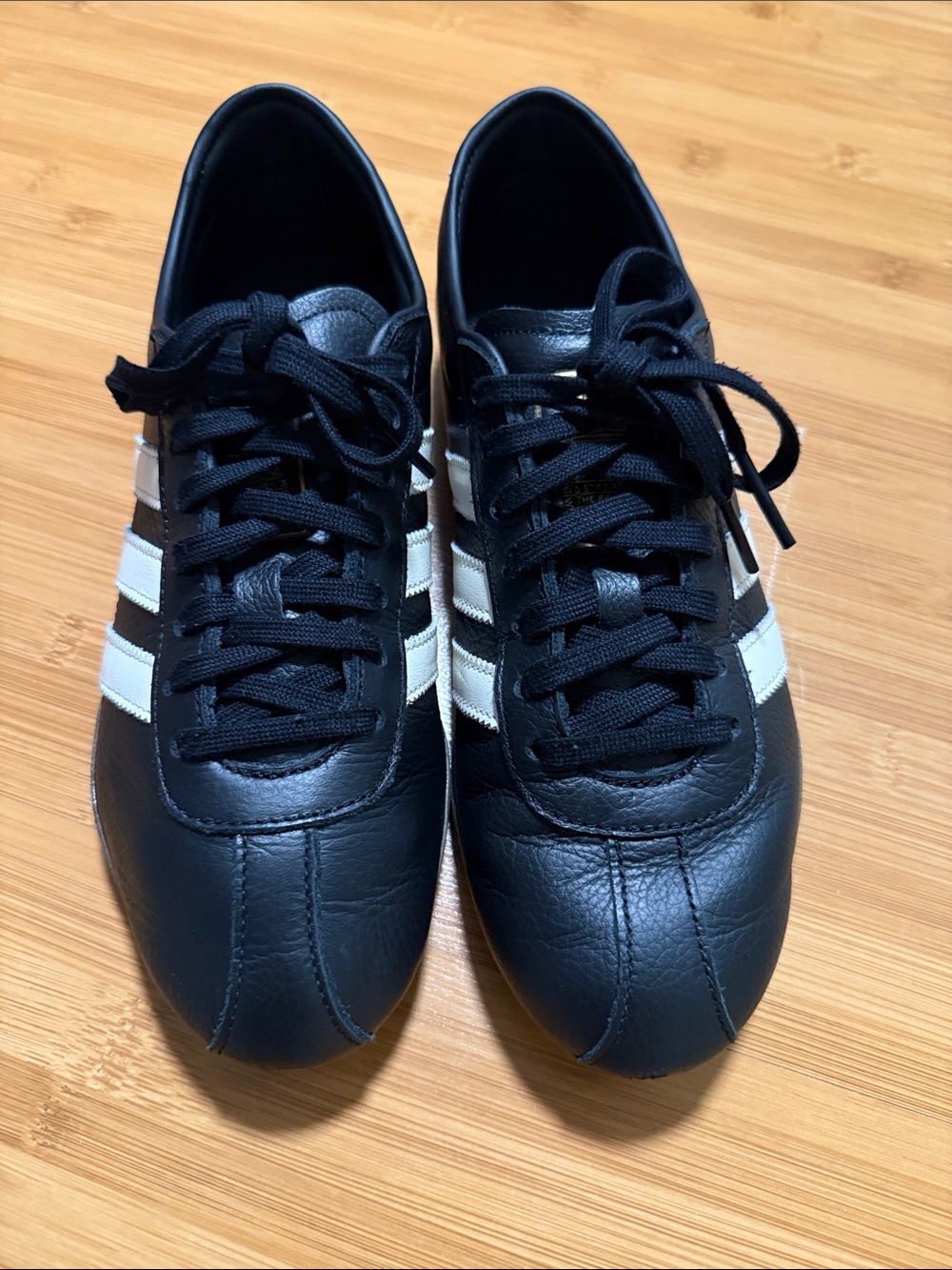Women’s Black Athletic Sneakers with White Stripes
